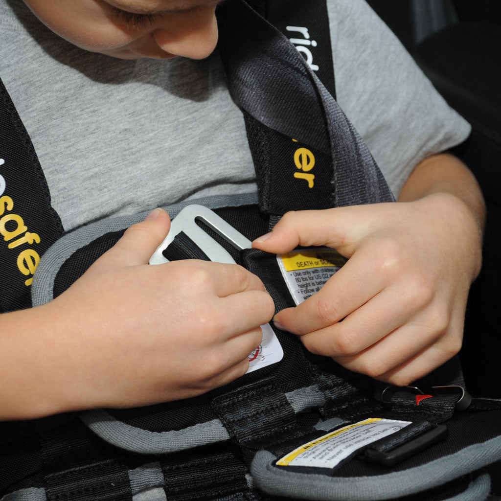 Child buckling RideSafer Gen 5